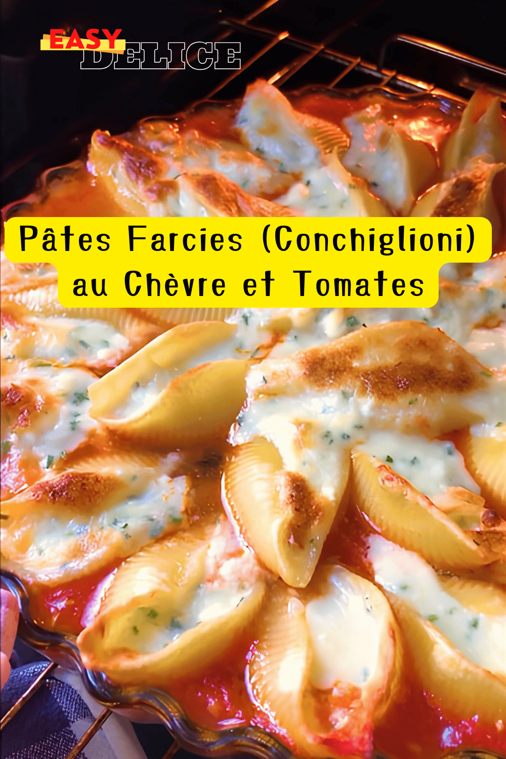 Conchiglioni farcis au chèvre et aux tomates, gratinés au four avec une garniture onctueuse.