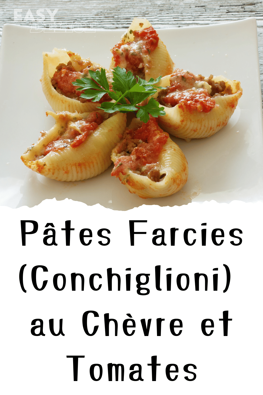 Conchiglioni farcis au chèvre et aux tomates, gratinés au four avec une garniture onctueuse.