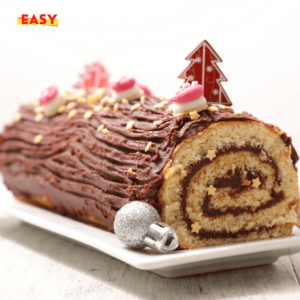 Bûche de Noël aux agrumes et amandes caramélisées, joliment présentée avec des zestes et des décorations festives.