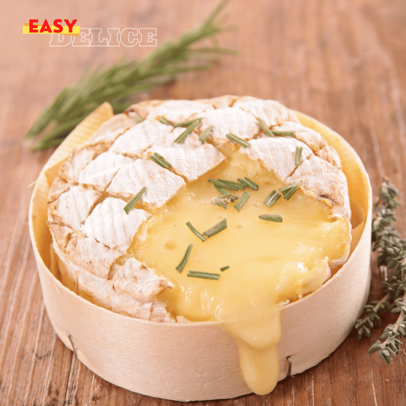 Camembert rôti au Air Fryer, doré et fondant, accompagné de pain grillé et de fruits secs.