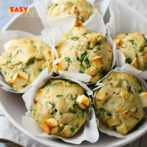 Muffins épinards et feta dorés et moelleux, parfaits pour un apéritif sain.