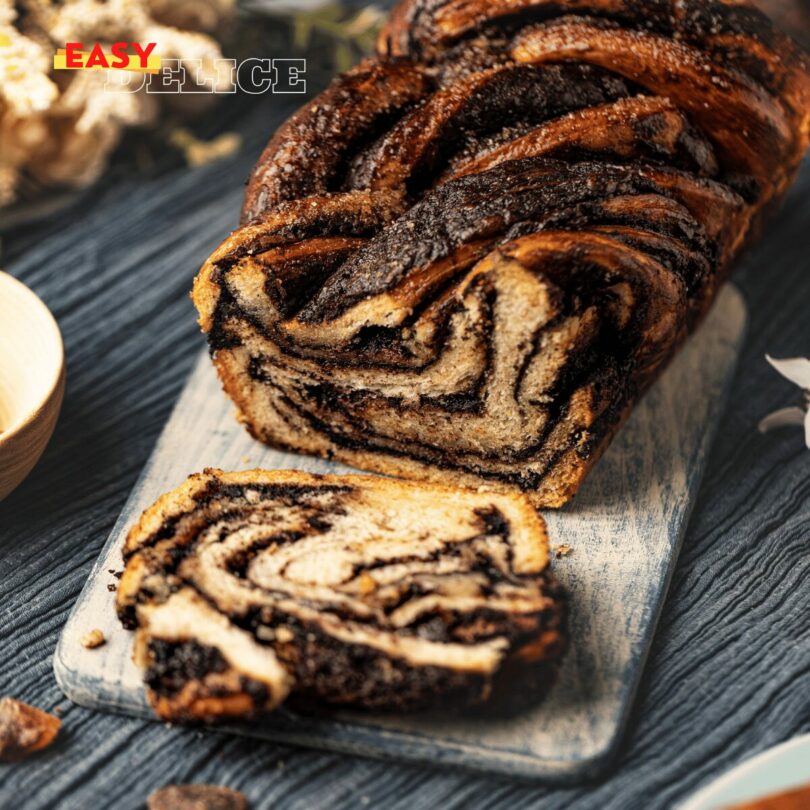 Brioche tressée au chocolat dorée et moelleuse, avec un cœur fondant au chocolat.